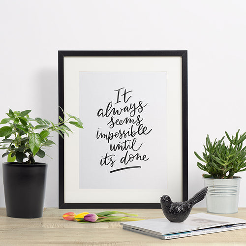It Always Seems Impossible Until It's Done - hand lettered typographic quote in black watercolour