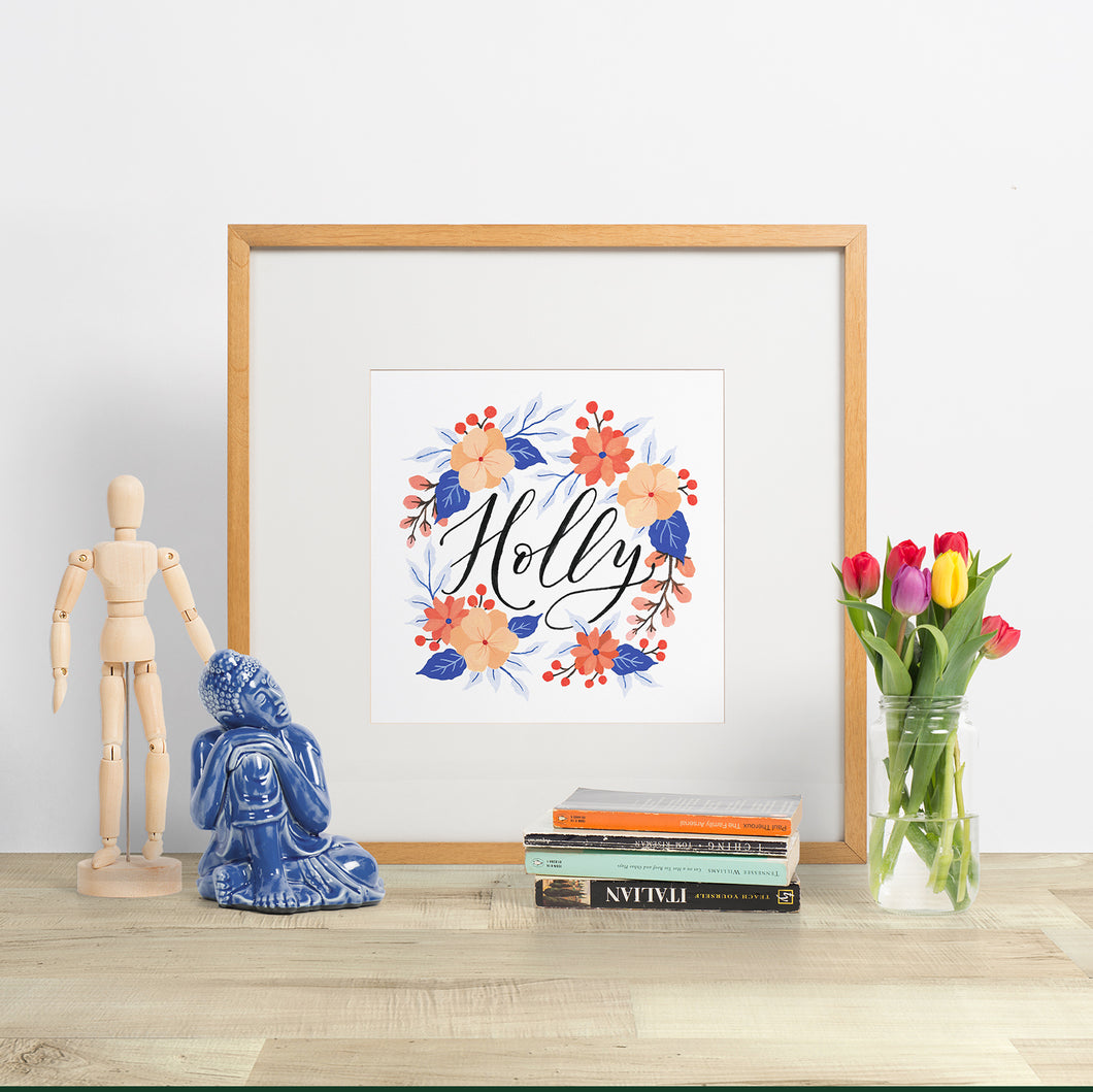 custom made artwork for nursery. hand lettered baby name with a floral wreath, made in nz